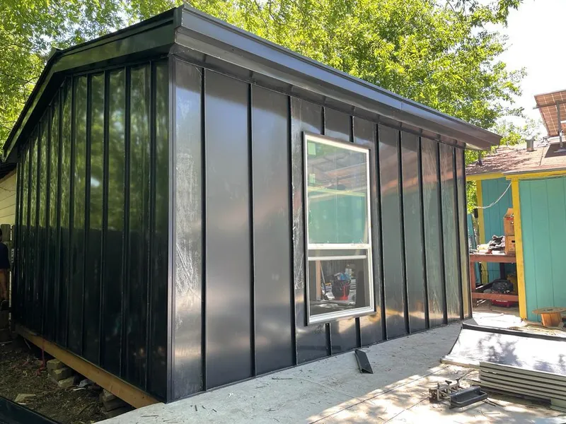 Black standing seam metal wall panels for Roof Inspection in Mokena