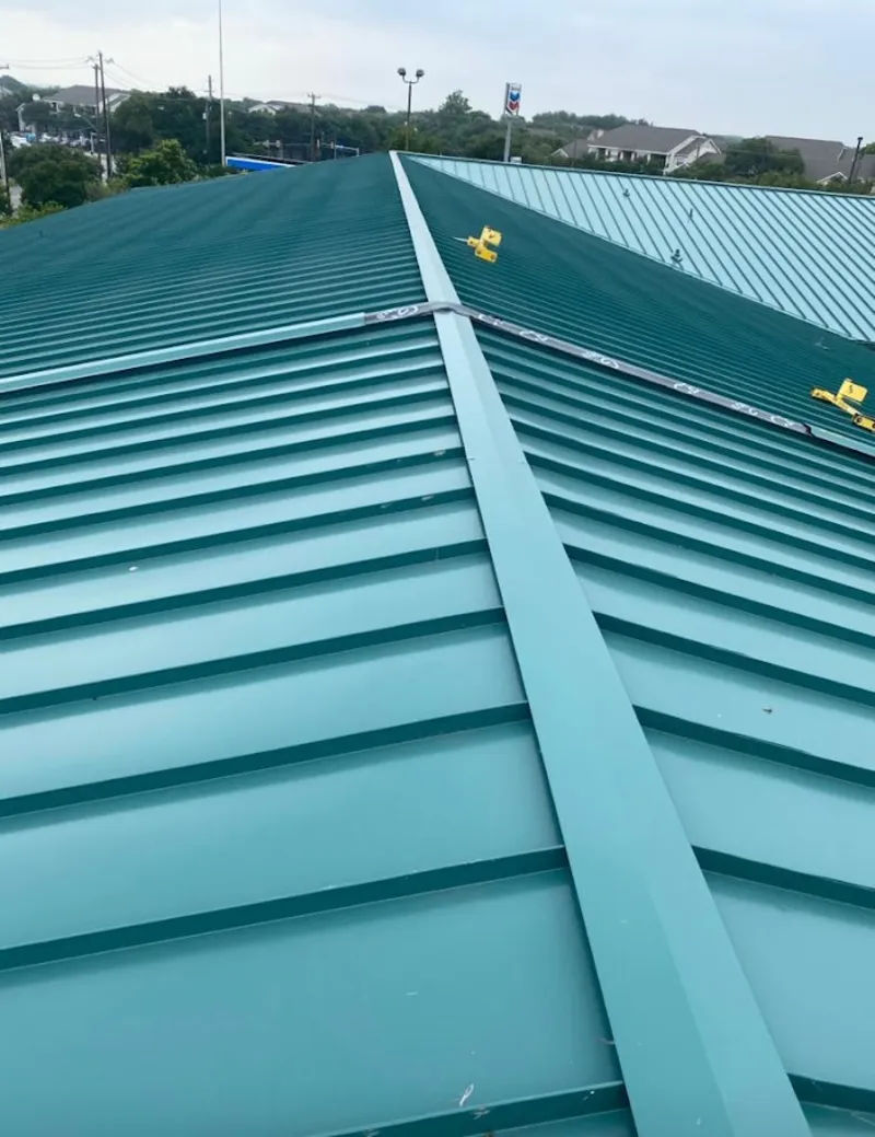 Green commercial metal roof ridge and valley for Metal Roof Repair in Mokena