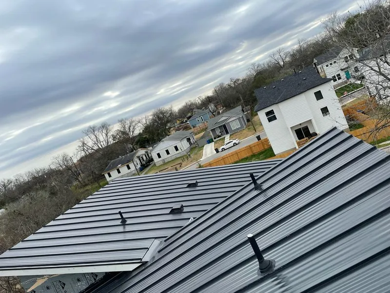 Standing seam metal roof panels with vents for Skylight Repair in Mokena